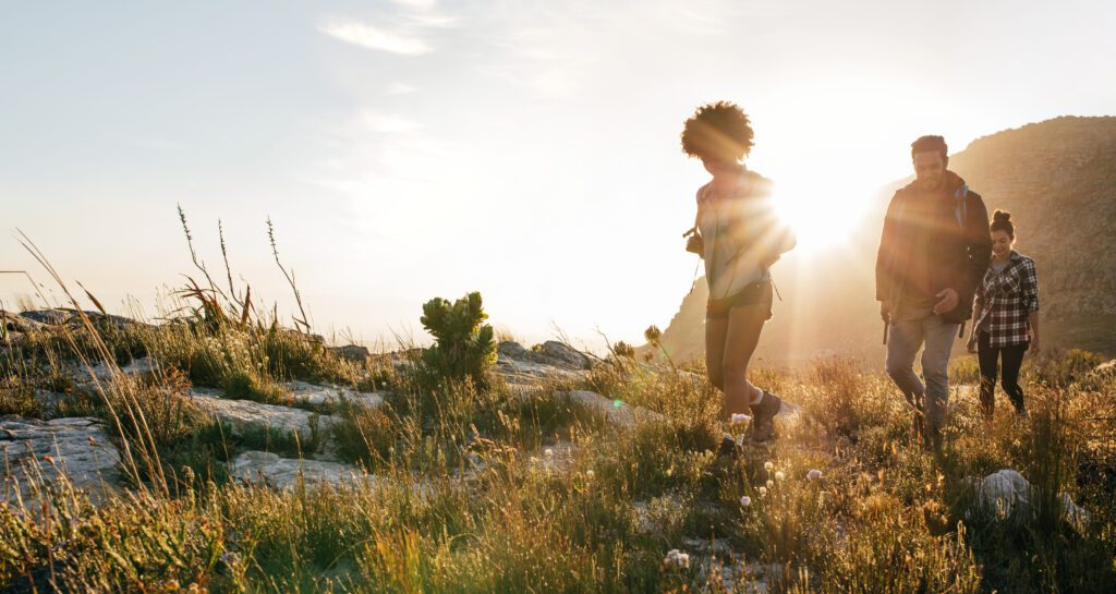 friends hiking without skin cancer