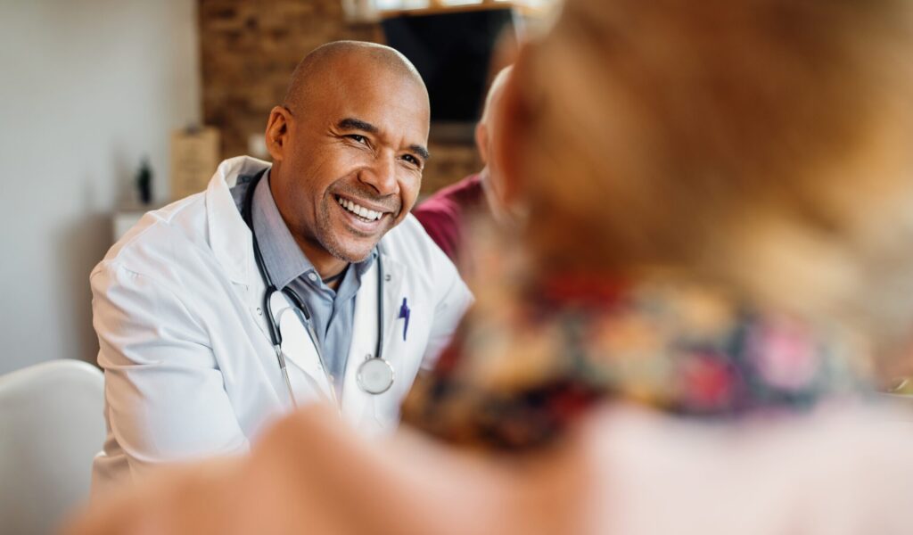 doctor discussing direct primary care model with patient