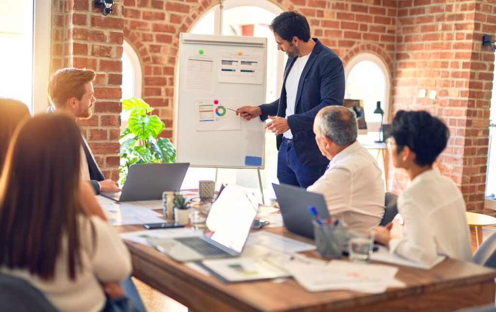 man giving presentation in office